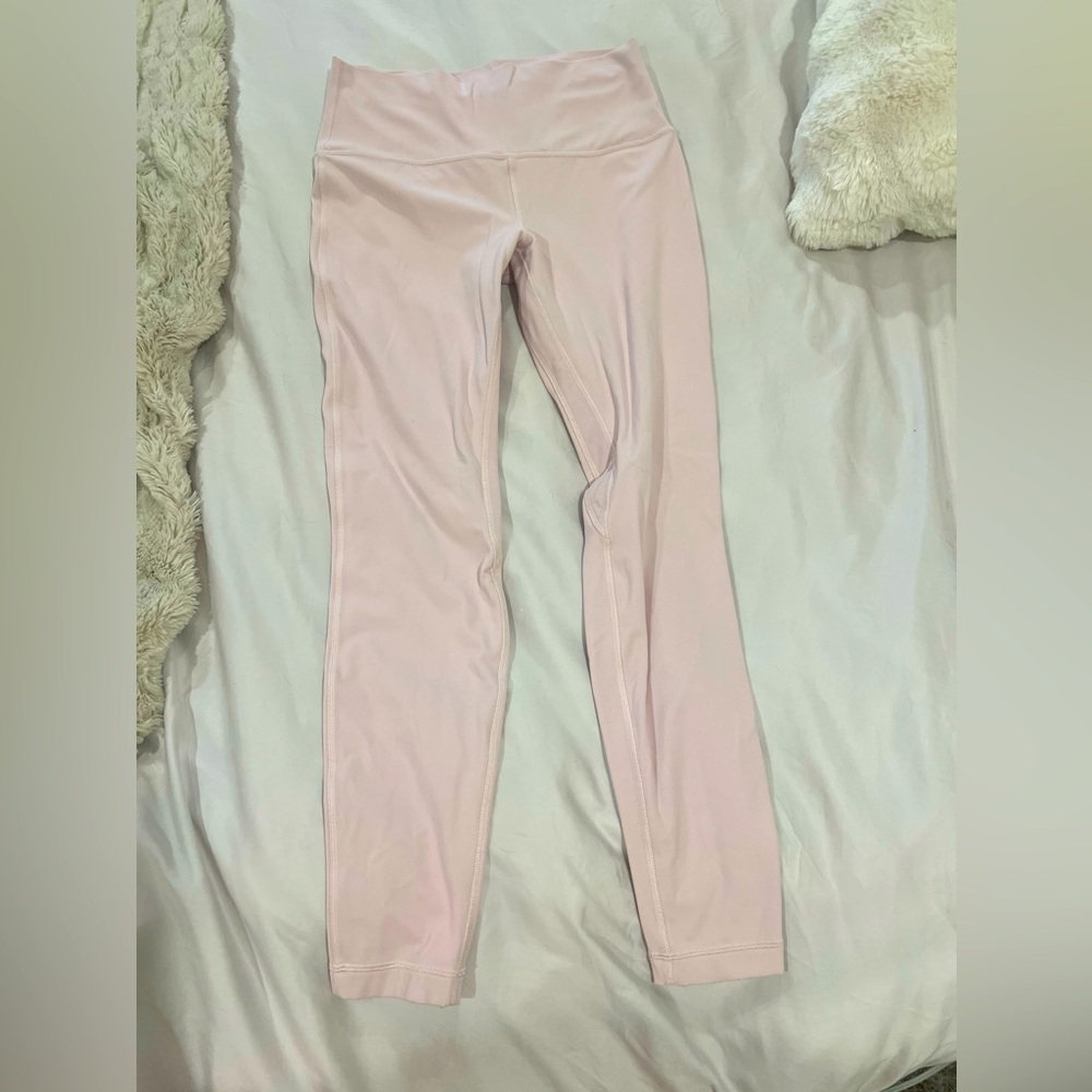 Light pink Lululemon leggings.